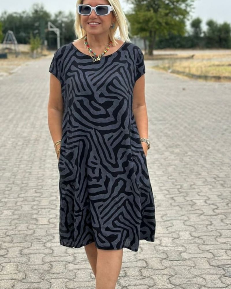 Canan | Robe d'été à col rond et joli imprimé