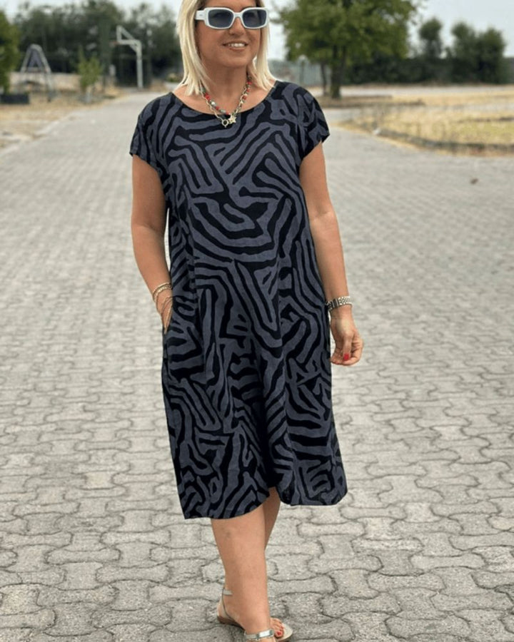 Canan | Robe d'été à col rond et joli imprimé
