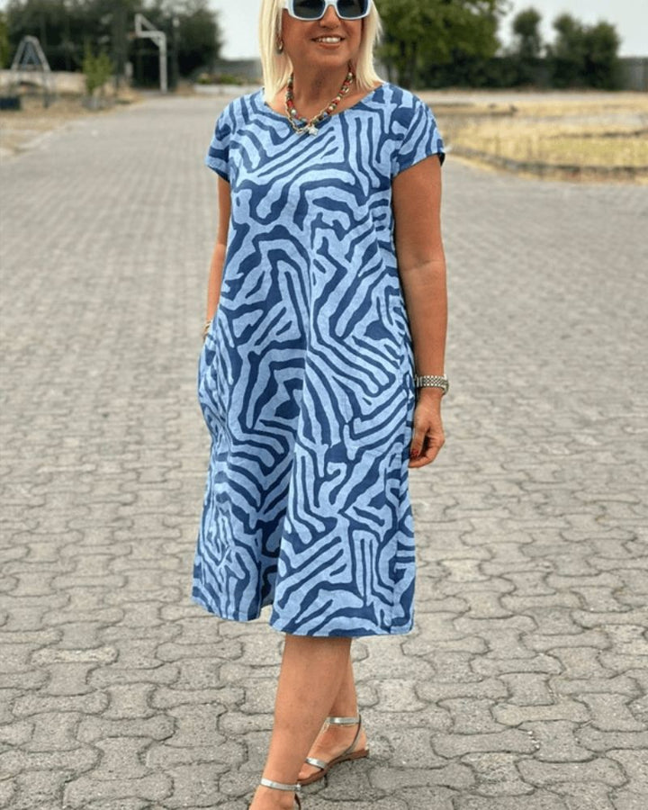 Canan | Robe d'été à col rond et joli imprimé