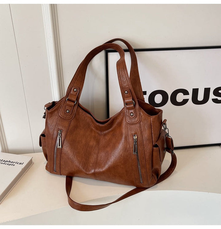 Bloom ™ |  Novira leren tas