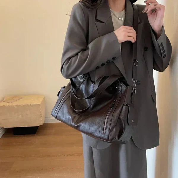 Bloom ™ |  Novira leren tas